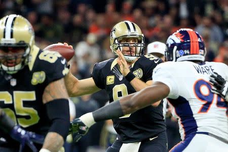 Nov 13, 2016; New Orleans, LA, USA; New Orleans Saints quarterback Drew Brees (9) throws against the Denver Broncos during the first half of a game at the Mercedes-Benz Superdome. Mandatory Credit: Derick E. Hingle-USA TODAY Sports