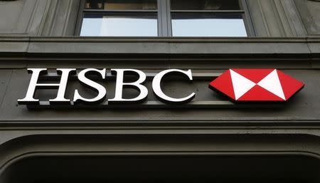 The HSBC bank logo is pictured at a branch office at the Paradeplatz in Zurich February 10, 2015. REUTERS/Arnd Wiegmann