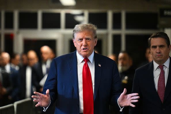 NEW YORK, NEW YORK - APRIL 15: Former U.S. President Donald Trump speaks to the press as he arrives for the first day of his trial for allegedly covering up hush money payments at Manhattan Criminal Court on April 15, 2024 in New York City. Former President Donald Trump faces 34 felony counts of falsifying business records in the first of his criminal cases to go to trial. (Photo by Angela Weiss - Pool/Getty Images)