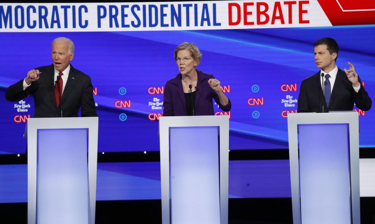 <span class="caption">Joe Biden, Elizabeth Warren and Pete Buttigeig at the Oct. 15, 2019 debate at Otterbein University in Westerville, Ohio. </span> <span class="attribution"><a class="link " href="http://www.apimages.com/metadata/Index/APTOPIX-Election-2020-Debate/369ab17a3a09469eba384c5e3e0b2e3c/16/0" rel="nofollow noopener" target="_blank" data-ylk="slk:John Minchillo/AP Photo;elm:context_link;itc:0;sec:content-canvas">John Minchillo/AP Photo</a></span>