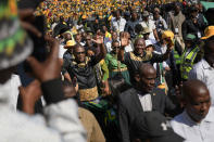 South African President Cyril Ramaphosa greets African National Congress supporters at the Siyanqoba rally at FNB stadium in Johannesburg, South Africa, Saturday, May 25, 2024. South African will vote in the 2024 general elections on May 29. (AP Photo/Jerome Delay)