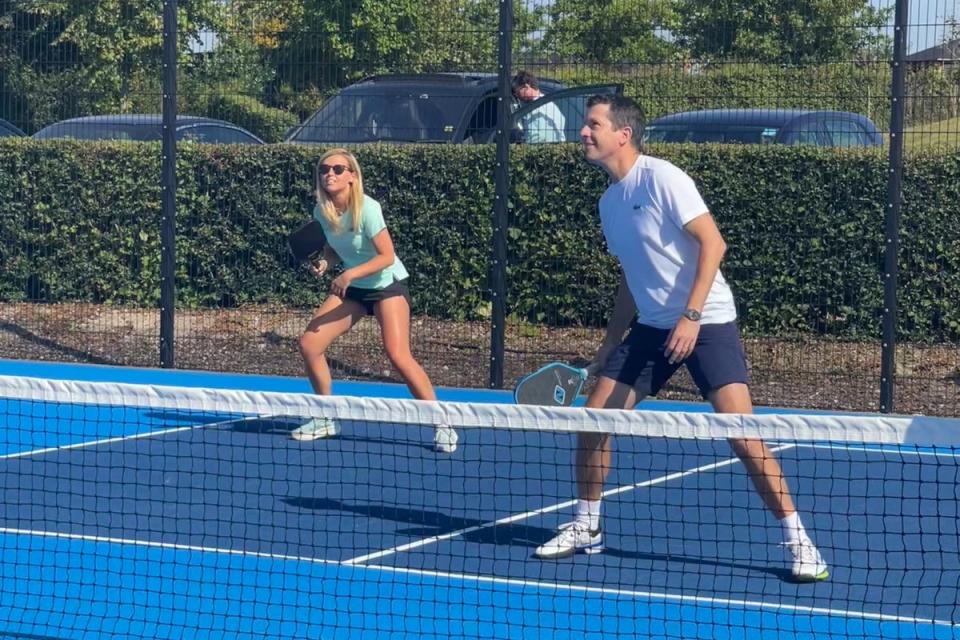 Katie tries a doubles match with tennis legend Tim Henman (Katie Strick)