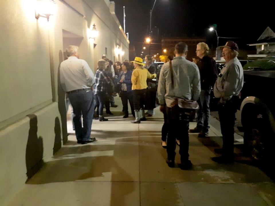 Residents of Dodge City, Kan., wait outside City Hall to speak before the city commission regarding the city's mask mandate on Nov. 16, 2020.