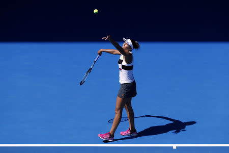 Tennis - Australian Open - Fourth Round - Melbourne Park, Melbourne, Australia, January 21, 2019. Madison Keys of the U.S. serves to Ukraine's Elina Svitolina. REUTERS/Aly Song