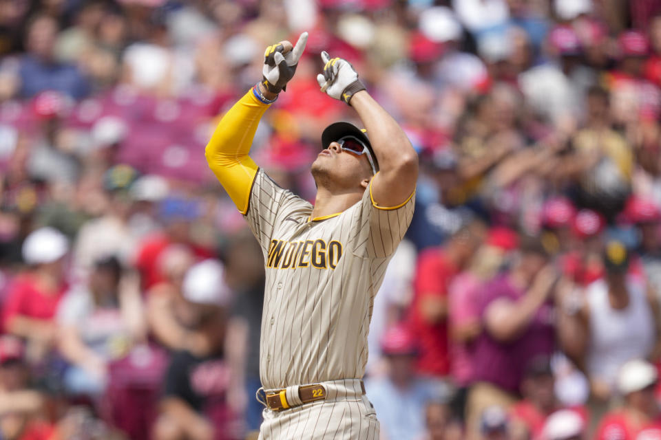 San Diego Padres' Juan Soto reacts as he rounds the bases after hitting a three-run home run during the sixth inning of a baseball game against the Cincinnati Reds Saturday, July 1, 2023, in Cincinnati. (AP Photo/Jeff Dean)