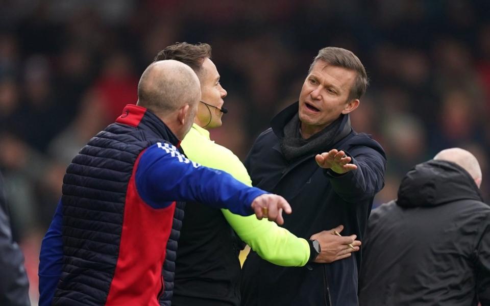 Leeds United manager Jesse Marsch argues with Accrington Stanley assistant manager Jimmy Bell during the Emirates FA Cup fourth round match at the Wham Stadium, Accrington - Mike Egerton/PA Wire