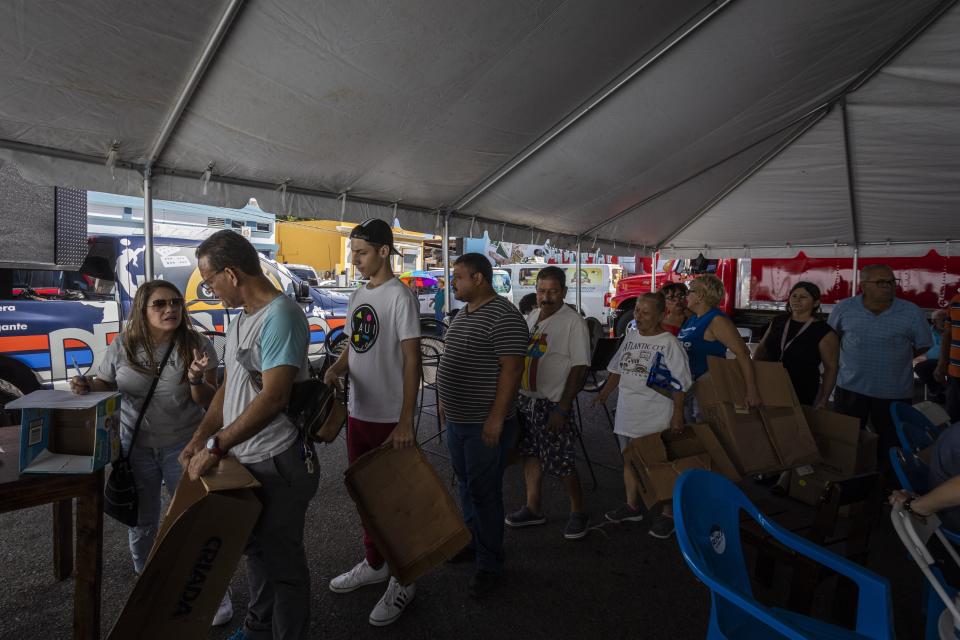 People line up to receive supplies after a 6.4-magnitude earthquake hit Guayanilla, Puerto Rico, on Jan. 11, 2020. (Photo: Anadolu Agency via Getty Images)