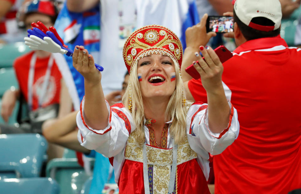 <p>A Russia fan inside the stadium before the match </p>