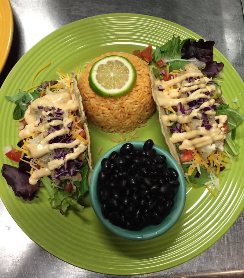 Tacos are drizzled with chipotle sauce at Tequila Lime Cantina in Fall River.