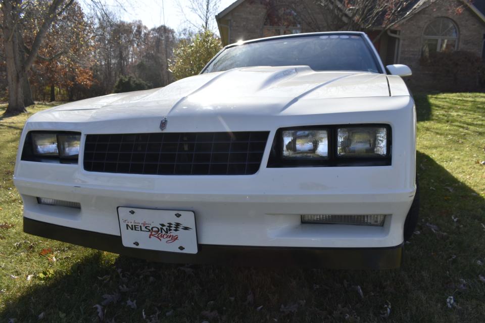 Carol Nelson's 1987 Monte Carlo. Under the hood: a 406 cubic-inch small block Chevy engine, 3.75 stroke forged crankshaft, 5.7-inch forged I beam rods, forged full floating pistons, racing heads, Hooker headers and Edelbrock intake and carb.
