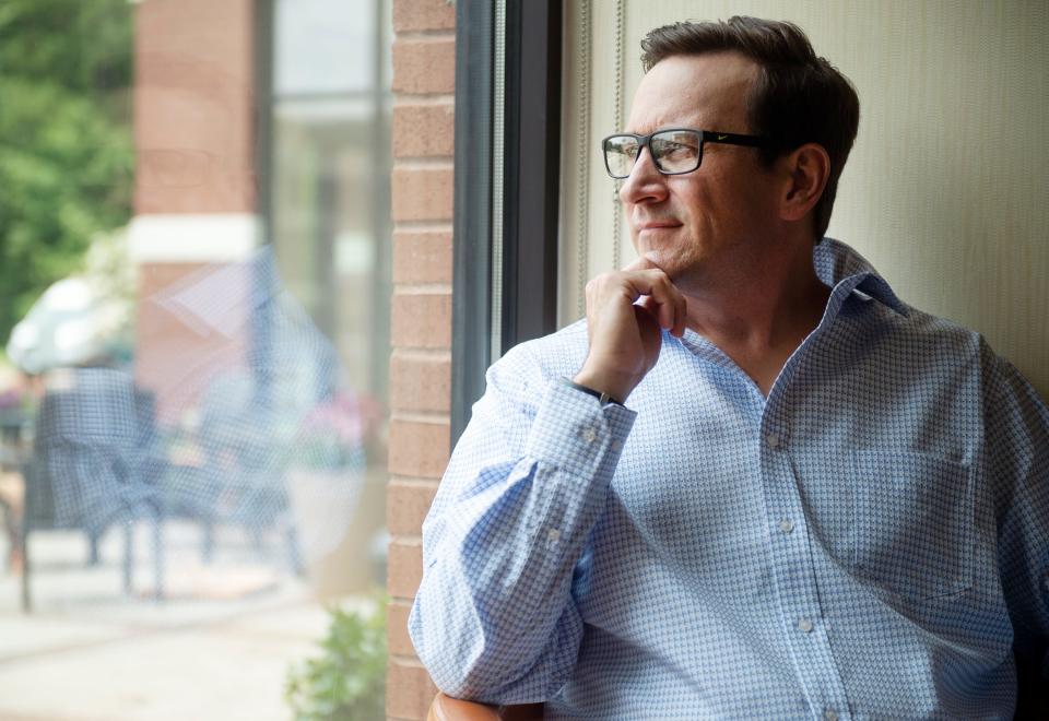 Mick Gillispie, of Maryland, poses for a portrait in Flowood, Miss., on June 24, 2021. Gillispie was abused by a Boy Scout merit badge counselor as a teenager in Maryland. Gillispie is speaking out against the abuse.