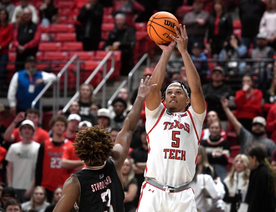 Texas Tech's guard Darrion Williams (5) shoots a 3-pointer against Omaha in a non-conference basketball game, Wednesday, Dec. 6, 2023, at United Supermarkets Arena.