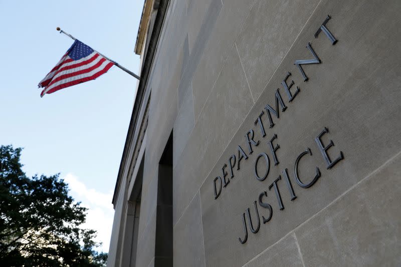 FILE PHOTO: Signage is seen at the United States Department of Justice headquarters in Washington, D.C.