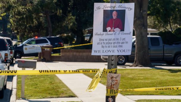 PHOTO: An image of Bishop David O'Connell is posted on the post of a street sign near his home in Hacienda Heights, Calif., Feb. 19, 2023. (Damian Dovarganes/AP)