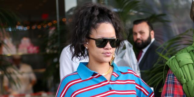 Pregnant Rihanna Shows Off Her Baby Bump in Camo Jacket & Dad Sneakers –  Footwear News