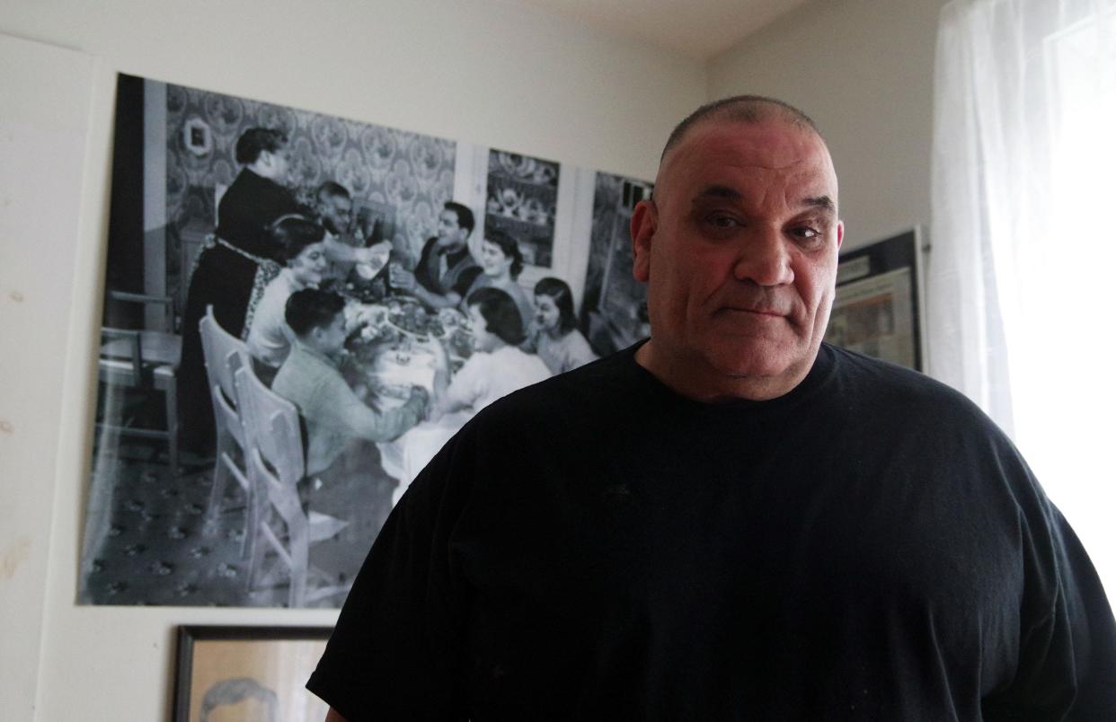 Mark Joseph Casieri bought the Rocky Marciano family home at 168 Dover St. in Brockton in 2001 and is hoping it will be placed on the National Register of Historic Places. Casieri, standing in the home on Monday, April 29, 2024, lives on the second floor with his wife but has devoted the first floor to Rocky memorabilia.