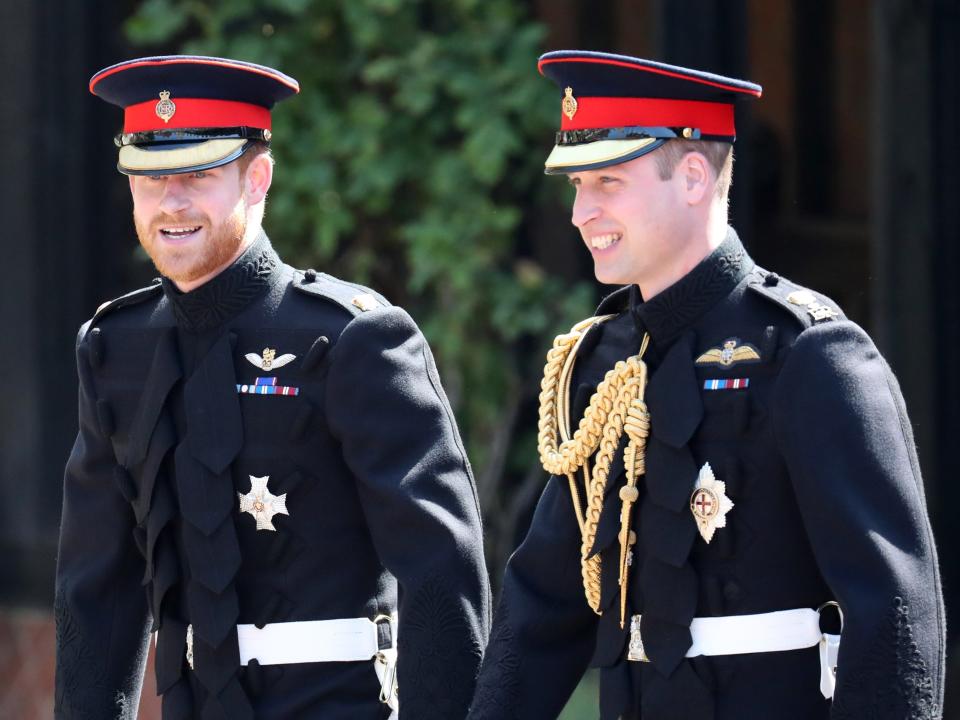 Prince Harry and Prince William stand together on Prince Harry's wedding day in 2018.