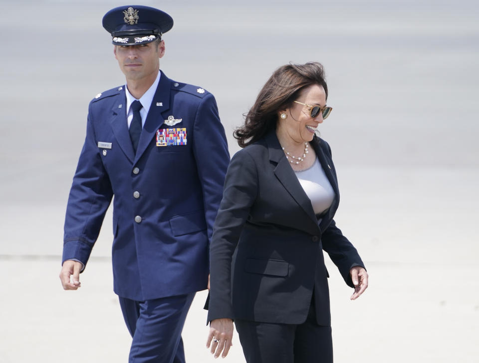 Vice President Kamala Harris boards Air Force Two as United States Air Force Lt. Col. Neil Senkowski walks behind her, as she leaves Andrews Air Force Base, Md., Sunday, June 6, 2021, en route to Guatemala City. (AP Photo/Jacquelyn Martin)