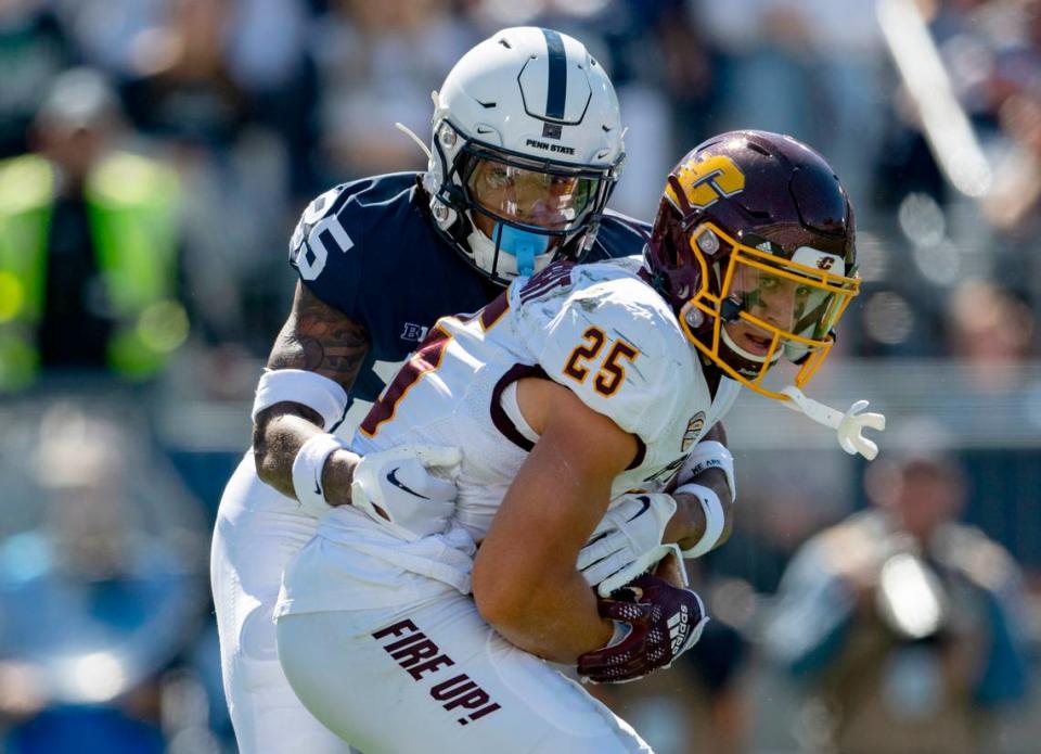 Penn State cornerback Daequan Hardy stops Central Michigan’s Noah Koenigsknecht during the game on Saturday, Sept. 24, 2022.