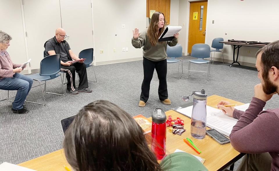 Jada Buehler reads her part in "Vanya, Sonya, Masha, Spike" during rehearsals for Monroe County Civic Theater on Jan. 20, 2024, at the Monroe County Public Library.