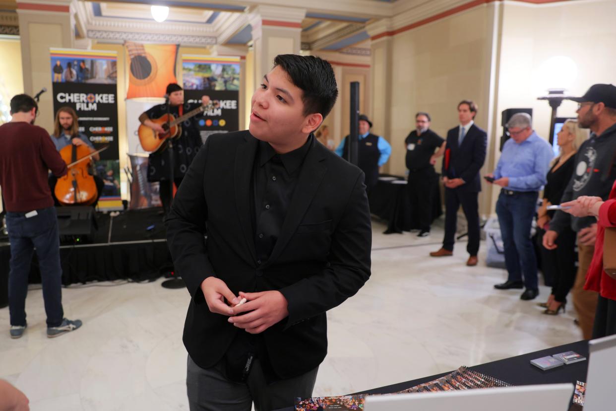 Lane Factor, from the television show Reservation Dogs, speaks Monday with people during Film and Music Day at the Capitol