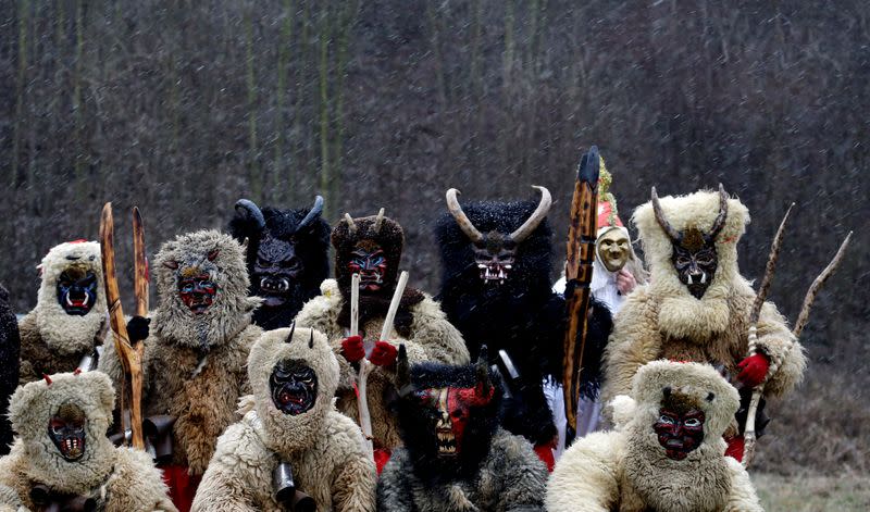 Revellers dressed as devils are seen in the village of Valasska Polanka