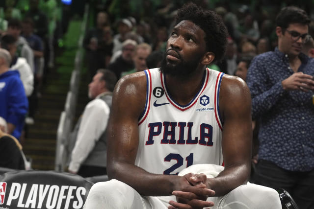 Philadelphia 76ers center Joel Embiid (21) watches from the bench as the 76ers fall behind the Boston Celtics during the second half of Game 7 in the NBA basketball Eastern Conference semifinal playoff series, Sunday, May 14, 2023, in Boston. (AP Photo/Steven Senne)