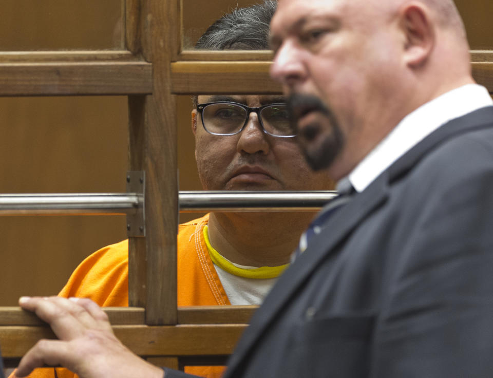 Naason Joaquin Garcia, the leader of Mexican megachurch La Luz del Mundo, listens to a court interpreter as he appears in Los Angeles County Superior Court on Friday, June 21, 2019. Naasón Joaquín García and his co-defendants were arrested earlier this month on suspicion of child rape, statutory rape, molestation, human trafficking, child pornography and extortion. The charges in the 26-count felony complaint detail allegations involving three girls and one woman between 2015 and 2018 in Los Angeles County. (AP Photo/Damian Dovarganes)