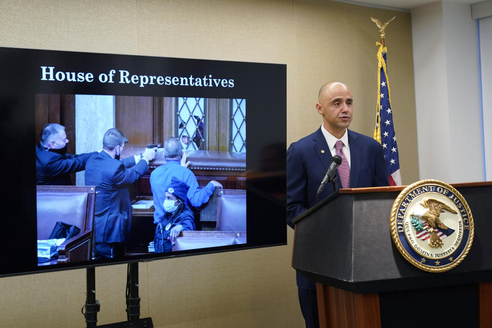 U.S. Attorney for the District of Colombia Matthew Graves speaks about the unfolding of the January 6 attack on the Capitol during a presentation ahead of this year's third anniversary in Washington, Thursday, Jan. 4, 2024. (AP Photo/Susan Walsh)