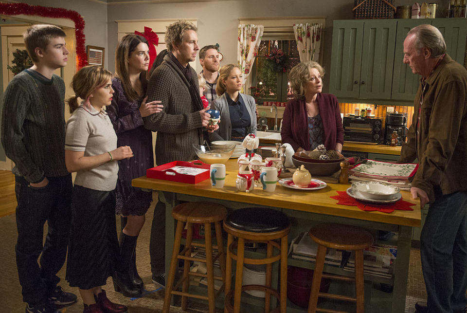 a large family in the kitchen