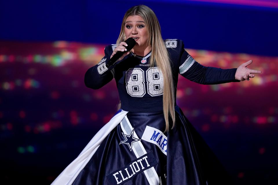 Host Kelly Clarkson talks during the NFL Honors award show.