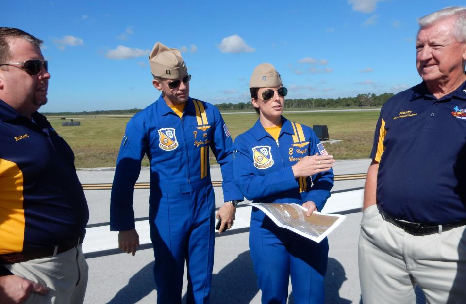In this image from 2016, Blue Angels #8 Capt. Corrie Mays discusses the airfield layout needed with air show president Robert Paugh, left, #8 Lt. Tyler Davies, and Marty Zickert.