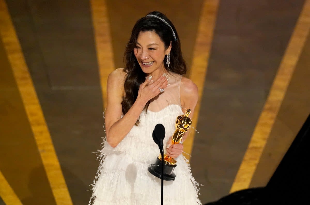 Michelle Yeoh accepts the award for best performance by an actress in a leading role for Everything Everywhere All at Once (Chris Pizzello/Invision/AP)