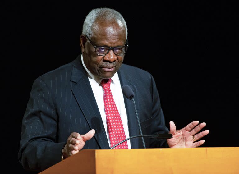 FILE - U.S. Supreme Court Associate Clarence Thomas speaks at the University of Notre Dame in South Bend, Ind., on Sept. 16, 2021. Thomas has been hospitalized because of an infection, the Supreme Court said Sunday, March 20, 2022. Thomas, 73, has been at Sibley Memorial Hospital in Washington, D.C., since Friday, March 18 after experiencing "flu-like symptoms," the court said in a statement. (Robert Franklin/South Bend Tribune via AP, File)