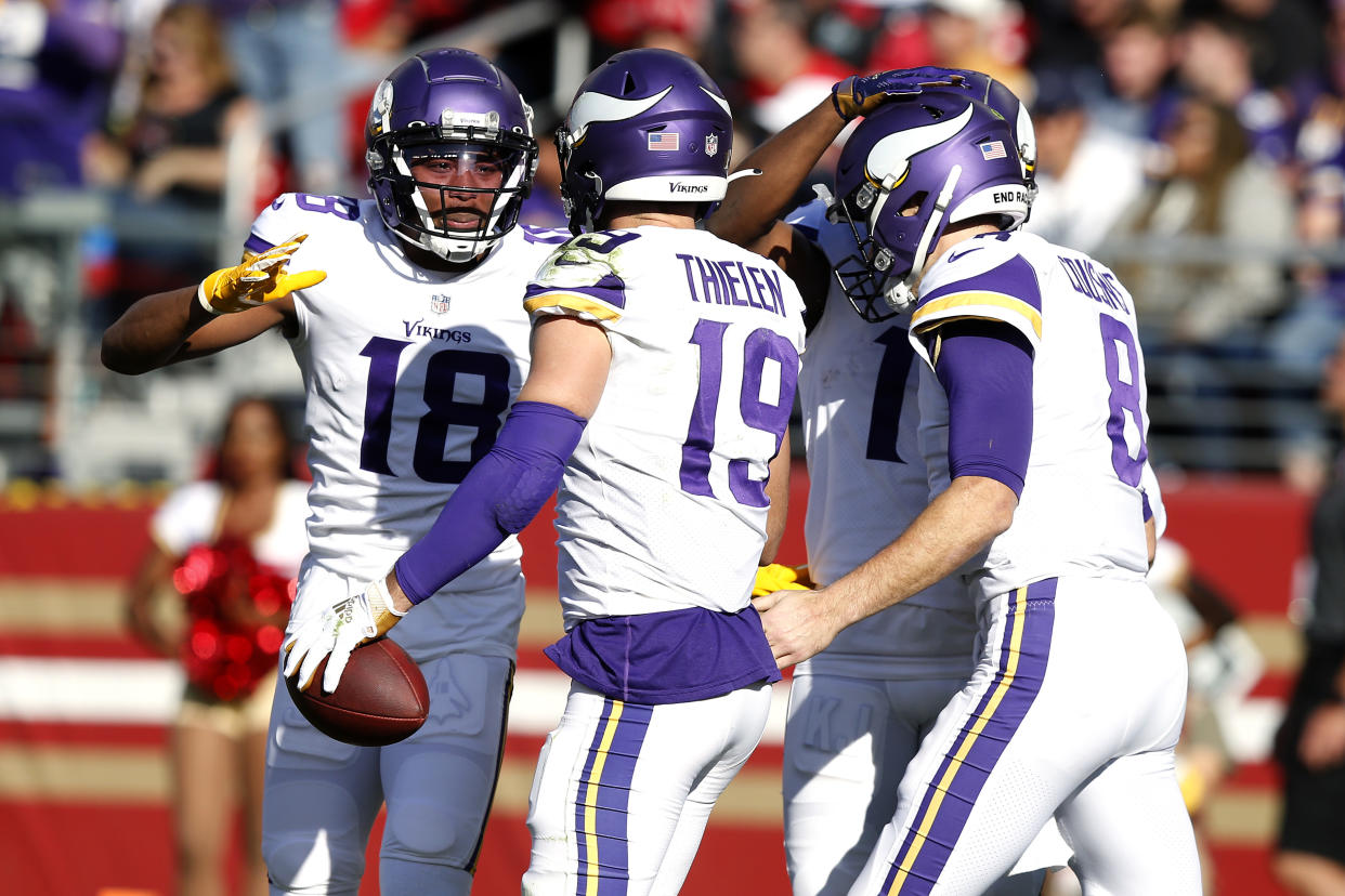 Adam Thielen #19 of the Minnesota Vikings and Justin Jefferson #18 and Kirk Cousins #8 are easy fantasy targets