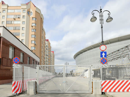 A view shows the Krylova Street, Number 27 apartment building in front of the Ekaterinburg Arena, which will host matches of the 2018 FIFA World Cup in the city of Yekaterinburg, Russia June 4, 2018. REUTERS/Alexei Kolchin