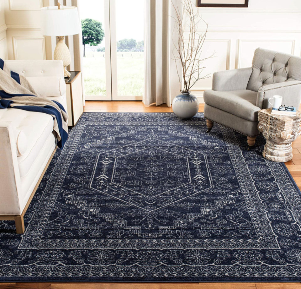 Safavieh Adirondack Collection Oriental Vintage Area Rug in Navy/Ivory (Photo via Amazon)