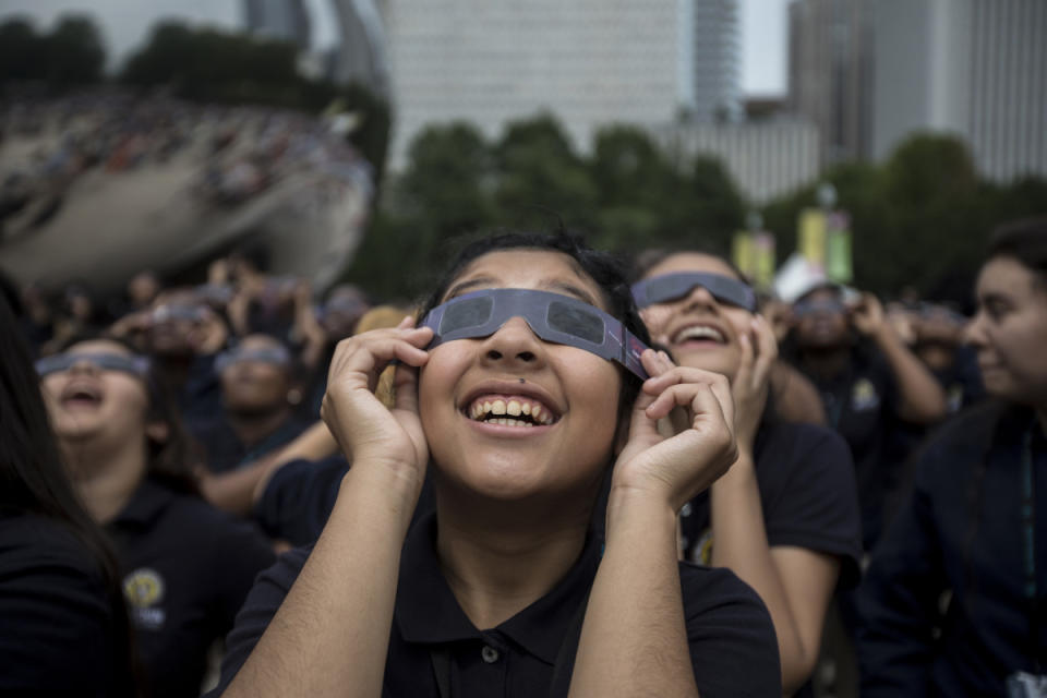 Students in Chicago watch the last total eclipse that occurred in 2017. Alexandra Wimley/Chicago Tribune/Tribune News Service.<p>Chicago Tribune/Getty Images</p>