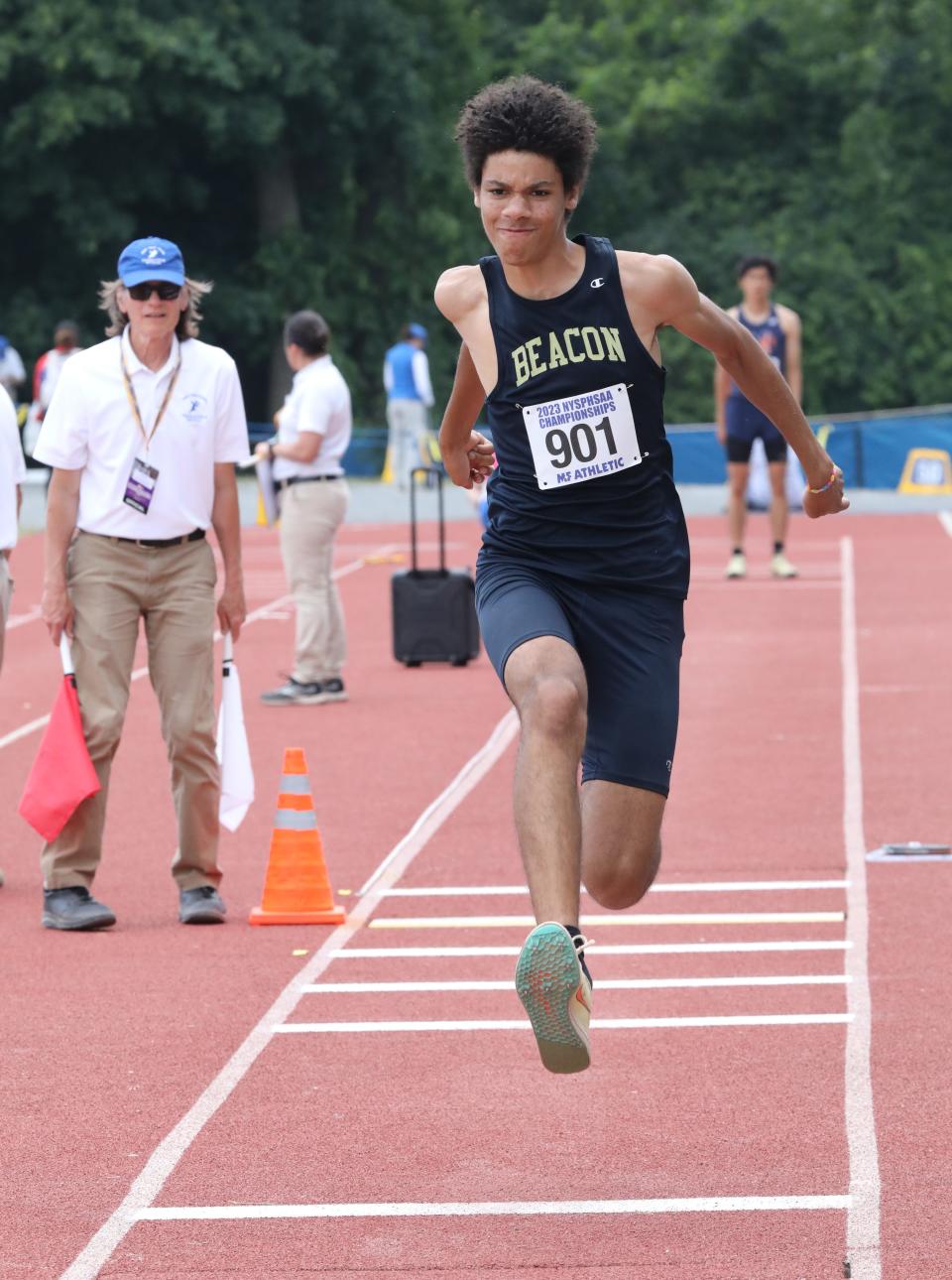 Damani DeLoatch from Beacon competes in the boys triple jump championship during the New York State Track and Field Championships at Middletown High School, June 10, 2023.