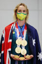 <p>Emma McKeon of Team Australia poses for a photo with her seven Olympics medals after the Australian Swimming Medallist press conference on day ten of the Tokyo Olympic Games on August 02, 2021 in Tokyo, Japan. (Photo by James Chance/Getty Images)</p> 