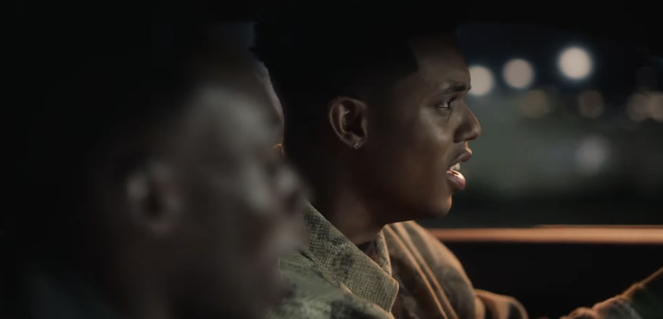 Jabari Banks and Olly Sholotan talk in a car at night in a scene from the TV series "Bel Air"