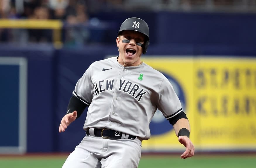 New York Yankees center fielder Harrison Bader (22) celebrates as he runs to third base against the Tampa Bay Rays during the eighth inning at Tropicana Field.