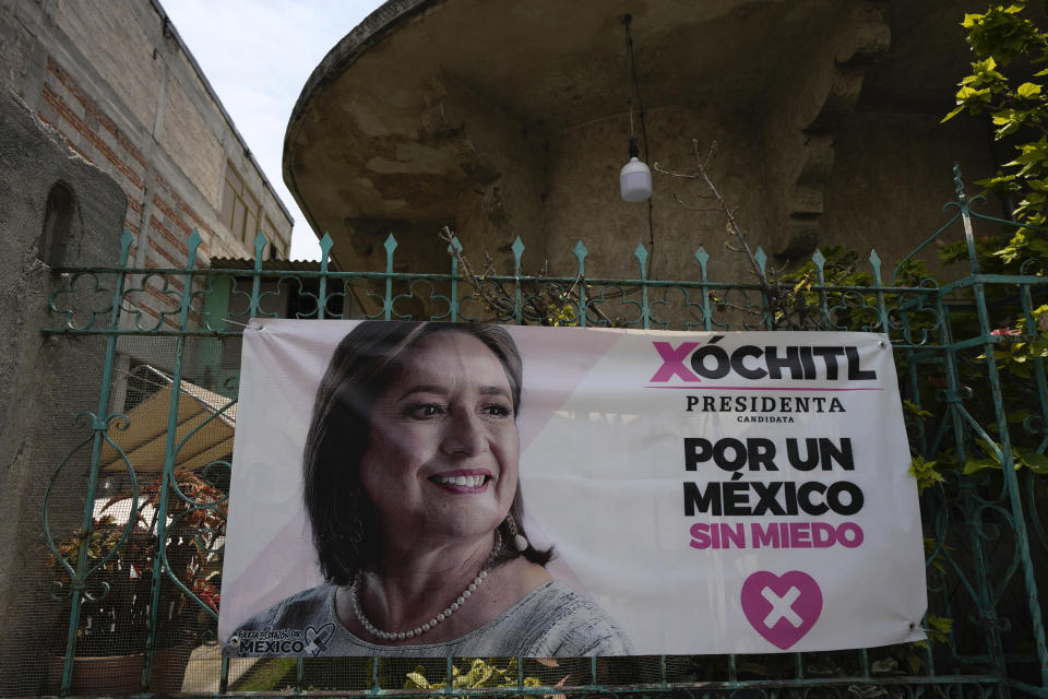 A campaign poster promoting presidential candidate Xóchitl Galvez, is displayed in her hometown of Tepatepec, Mexico, Friday, May 10, 2024. She represents a coalition that includes the PRI, which governed Mexico for 71 years, and she began her campaign as a political phenomenon backed by the country's business elites. But her popularity has been declining. (AP Photo/Fernando Llano)