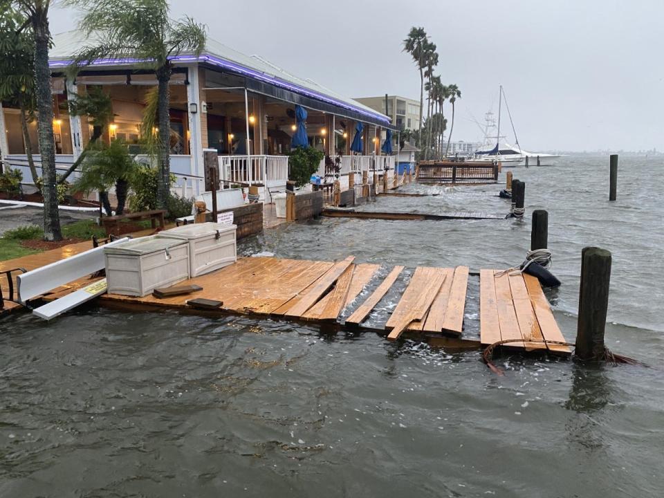 The Banana River is high and docks along the banks of the Banana River have been shredded behind Sunset Cafe in Cocoa Beach.