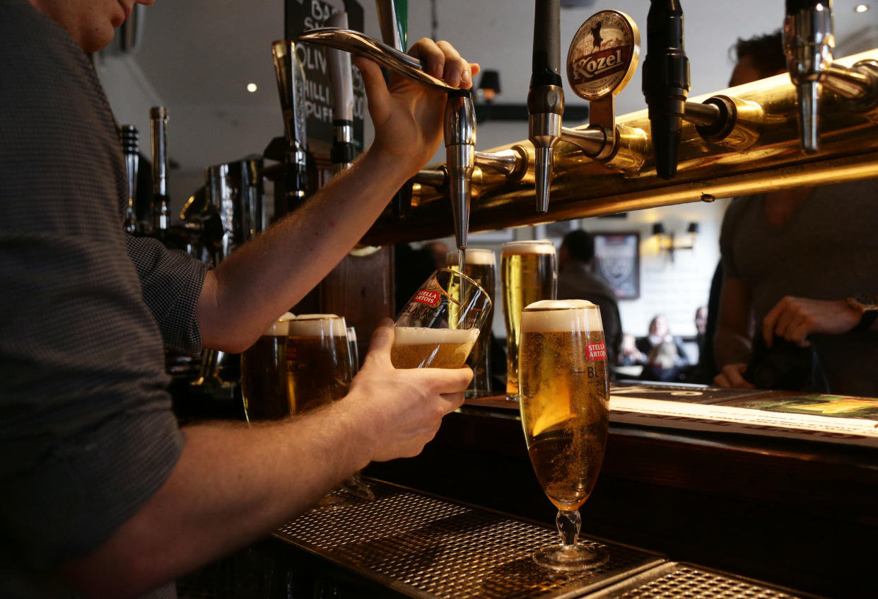 drinks being poured in a pub