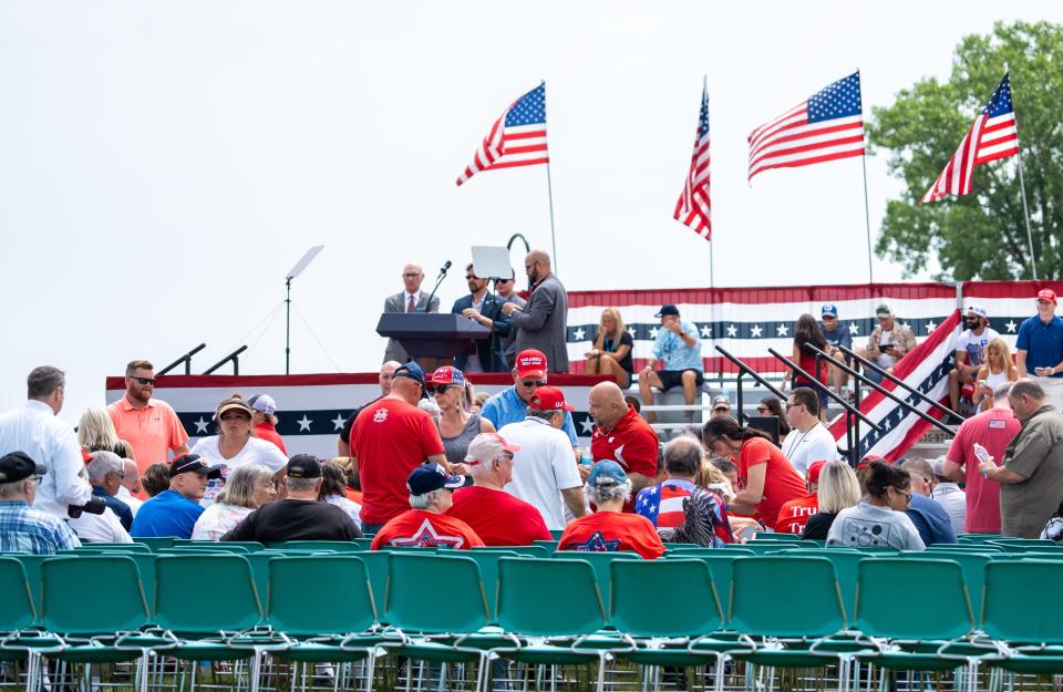 People begin to take their seats as former President Donald Trump is scheduled to speak at a rally on Tuesday June 18, 2024 at Racine Festival Park in Racine, Wis.