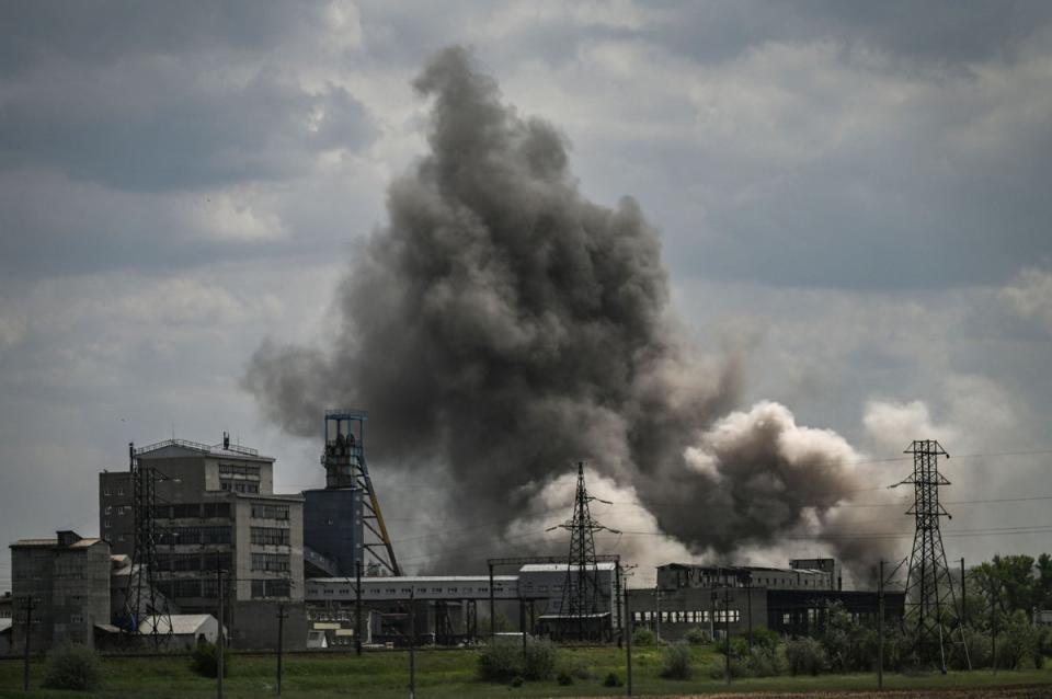 Smoke and dirt ascends after a strike at a factory in the city of Soledar at the eastern Ukranian region of Donbas (AFP via Getty Images)