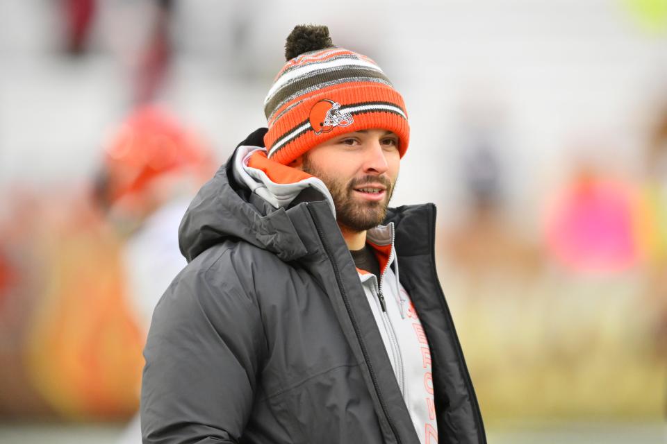 Cleveland Browns quarterback Baker Mayfield watches warm-ups before Sunday's season-finale against the Cincinnati Bengals. Mayfield did not play due to an injured shoulder.