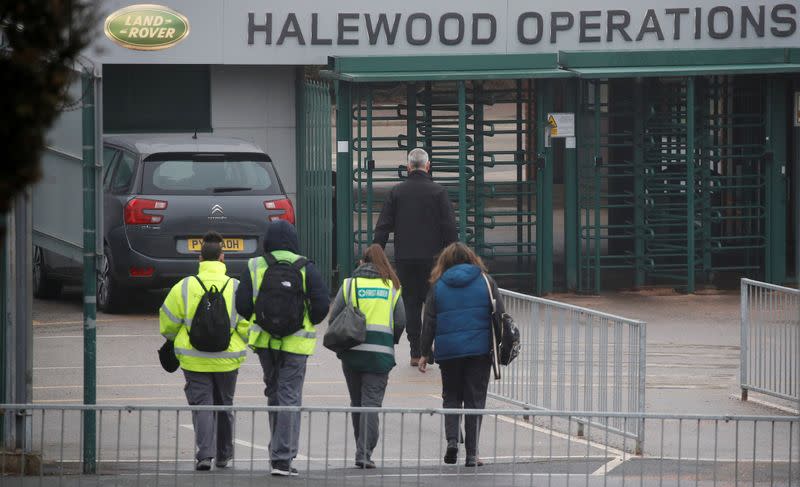 Workers arrive at Jaguar Land Rover's Halewood Plant in Liverpool