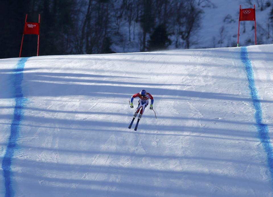 France's Thomas Mermillod Blondin goes airborne in the downhill run of the men's alpine skiing super combined event during the 2014 Sochi Winter Olympics at the Rosa Khutor Alpine Center in Rosa Khutor February 14, 2014. REUTERS/Leonhard Foeger